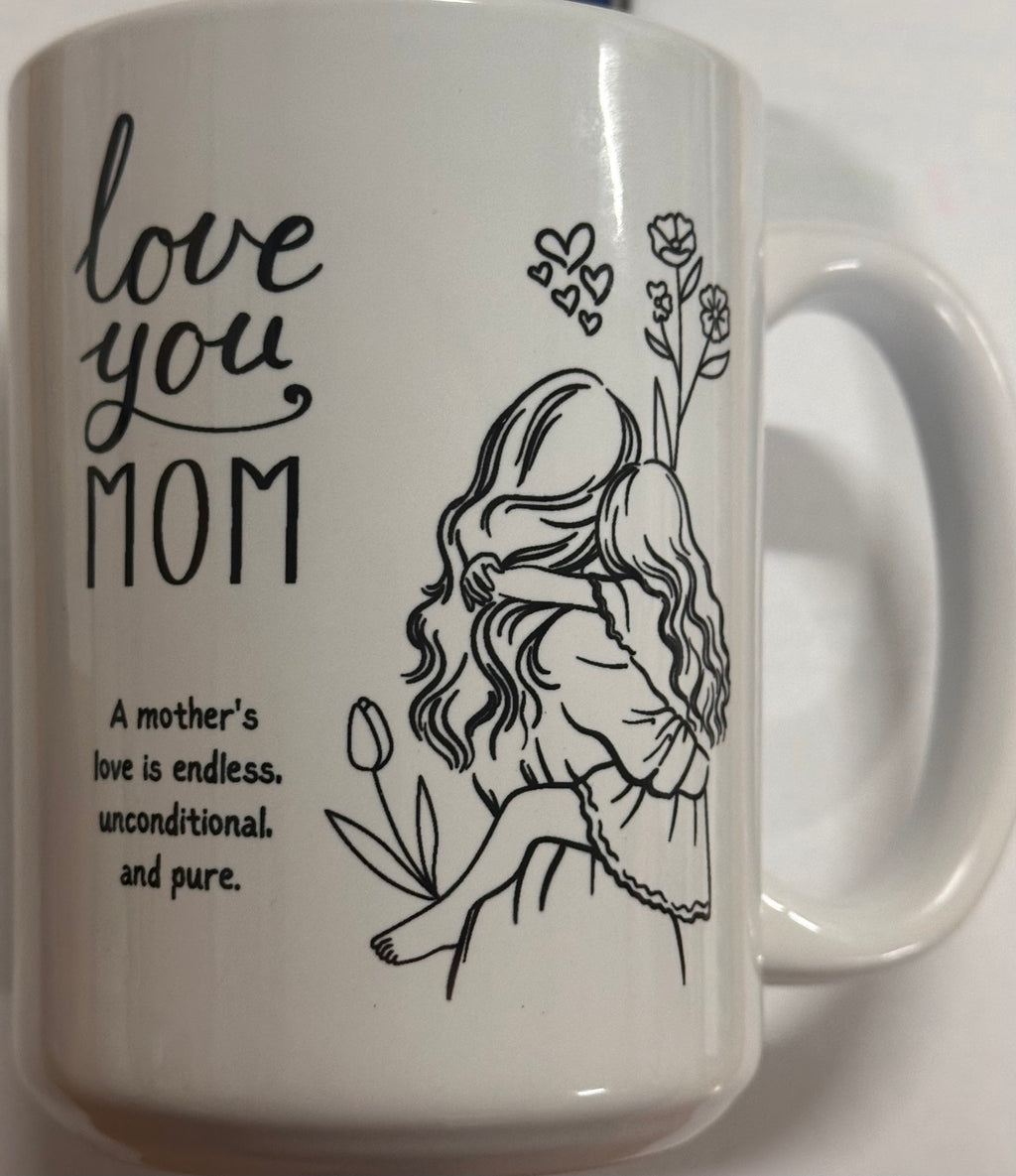White mug with black illustrations and text 'love you MOM' on a white background